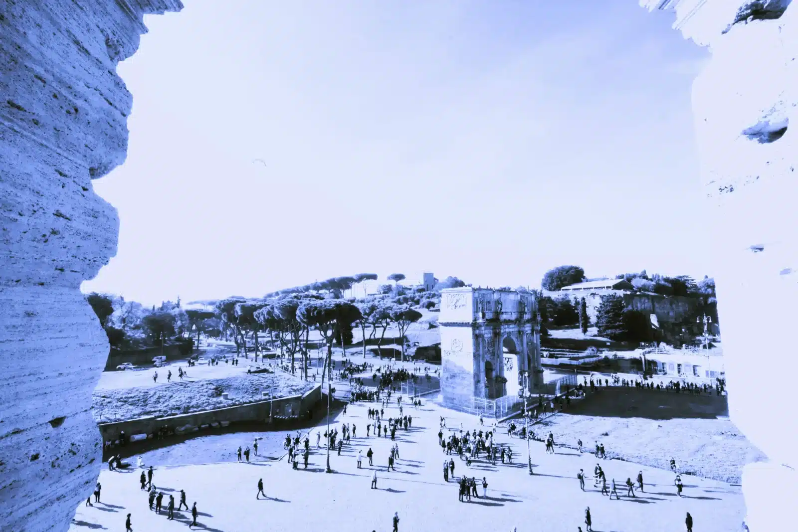 Panoramic view of Rome from the Colosseum, showcasing the historic cityscape and ancient architecture.