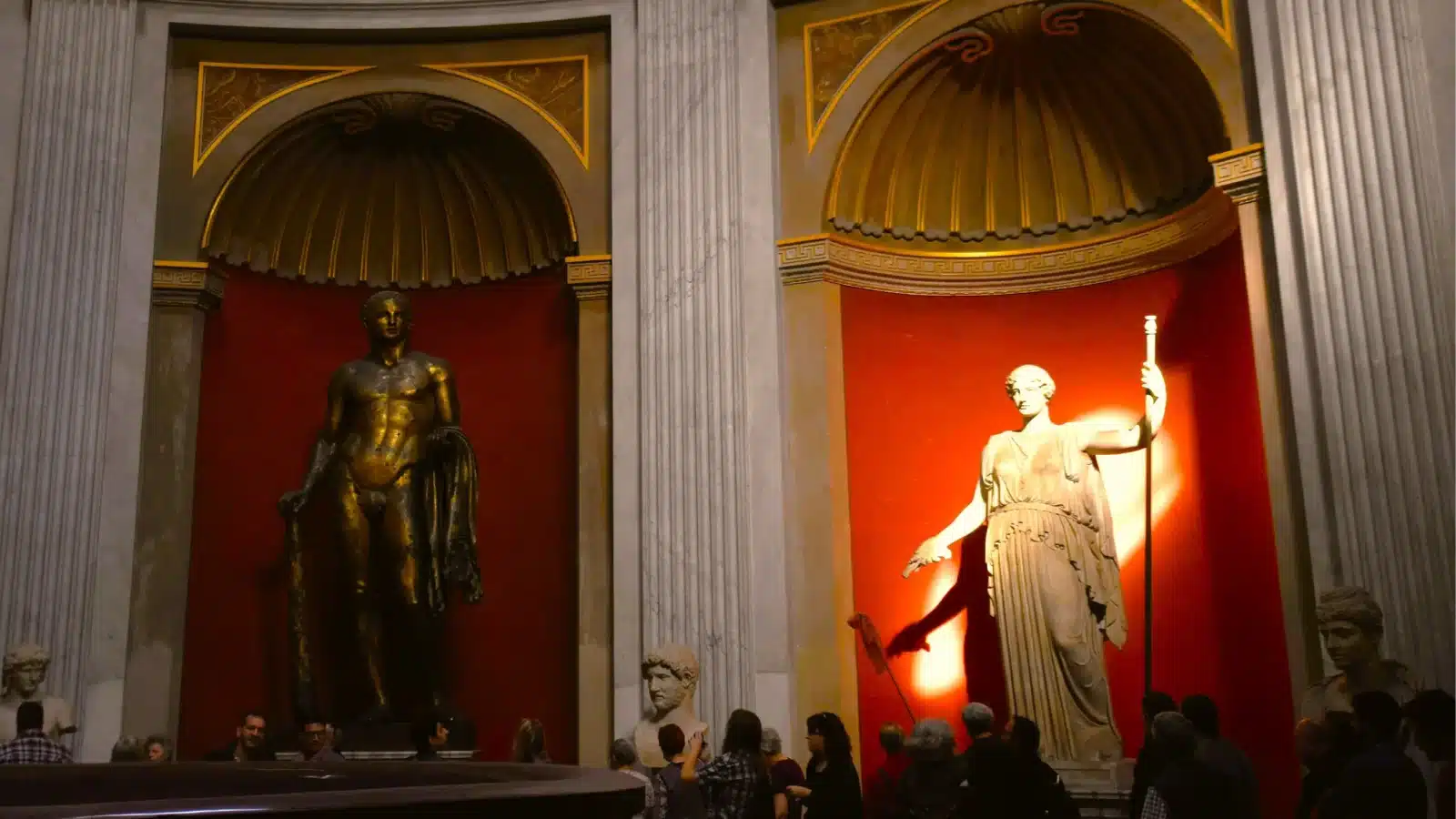 Ancient statues from Pompey’s Theatre displayed in the Round Room of the Vatican, showcasing classical Roman art and architecture.
