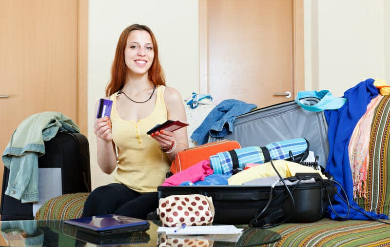 dreamstime s Girl Packing travel tips