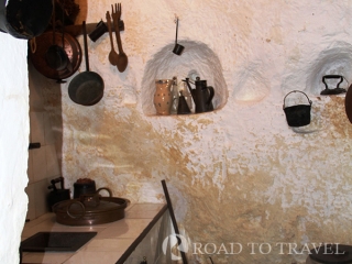 &lt;h2&gt;Matera - Casa Grotta &lt;/h2&gt; Matera - Casa Grotta Casa Grotta the family's kitchen. Niches were carved into the cave walls for storage.