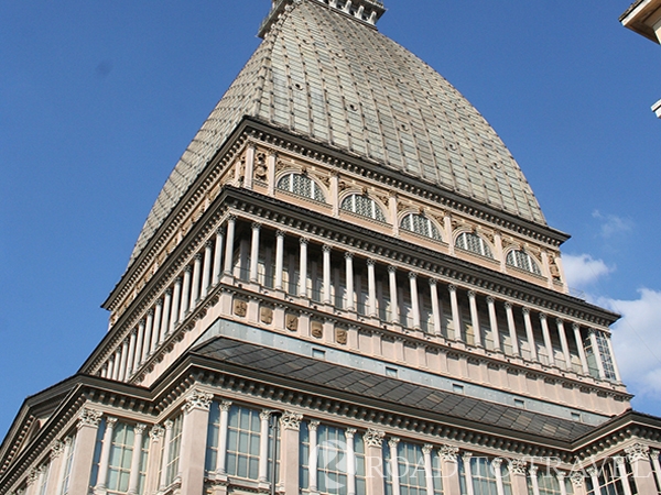 La Mole Antonelliana The Mole Antonelliana is a building of monumental proportions with its 168m (550 feet) of height,<br/> it could be considered the symbol of Turin. Since 2000 La Mole houses the National Museum of Cinema.